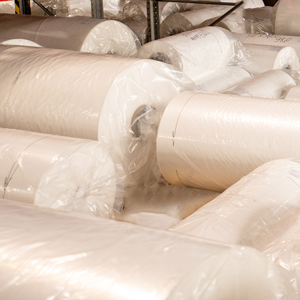 Rolled, packed and wrapped large bobbins of newly produced polyethylene film